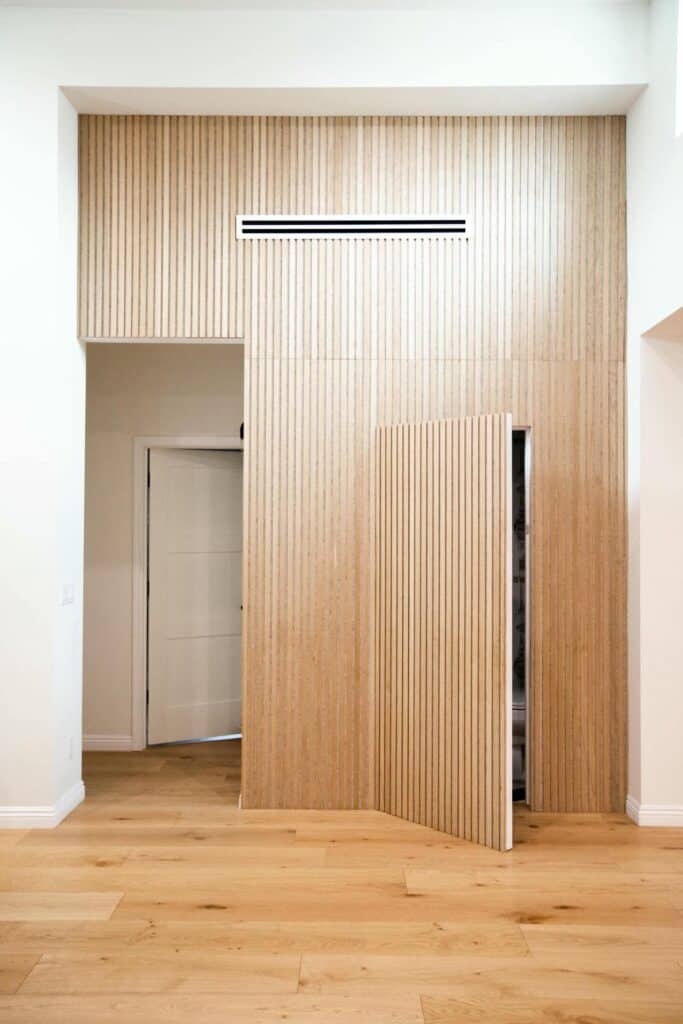 Wood closet doors and integrated shelving at Zelzah Avenue