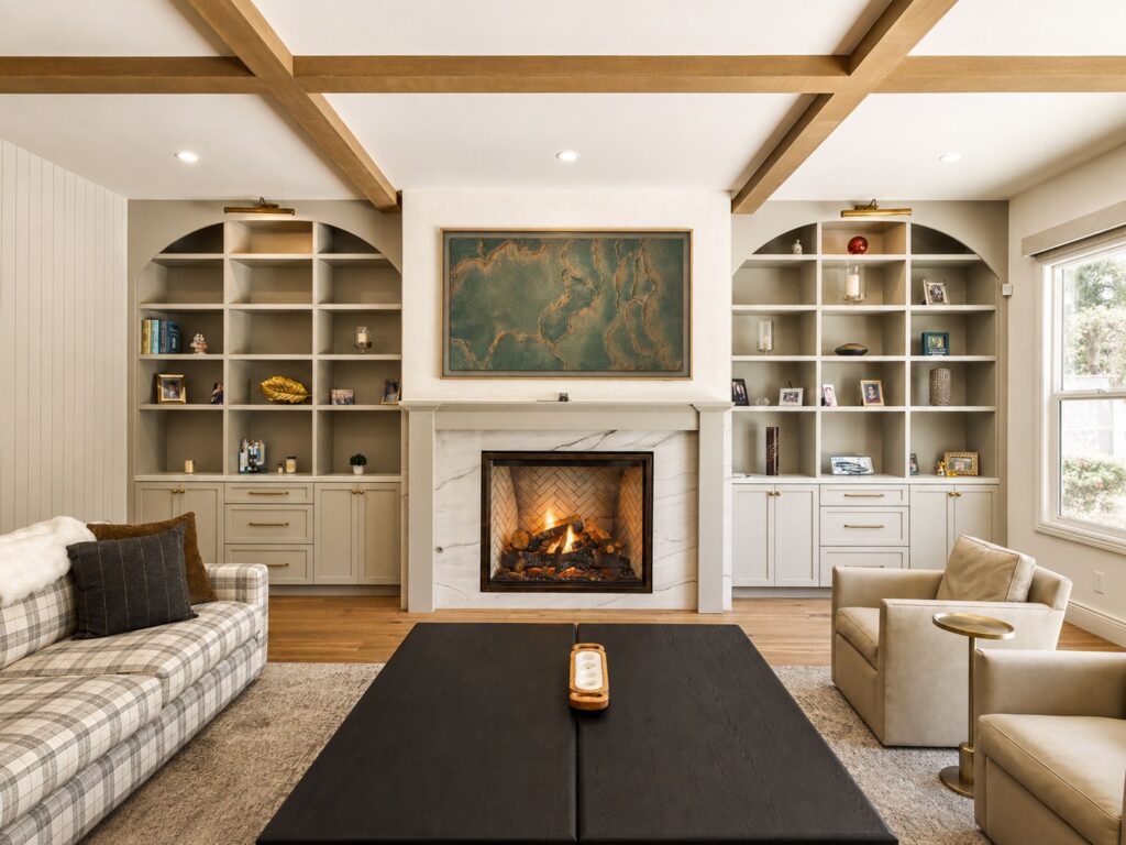 Living room fireplace with built-in shelves in the Loch Lomond home renovation